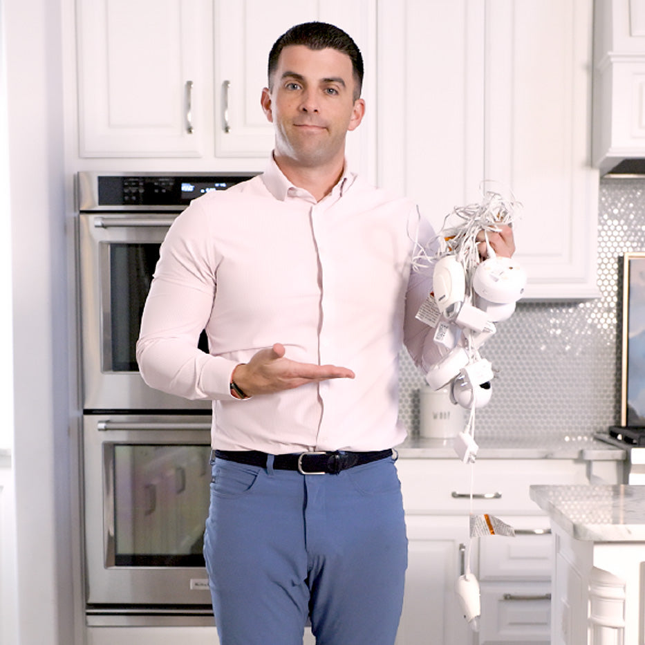 Harbor's CEO, Kevin Lavelle, holding trash baby monitors in the market