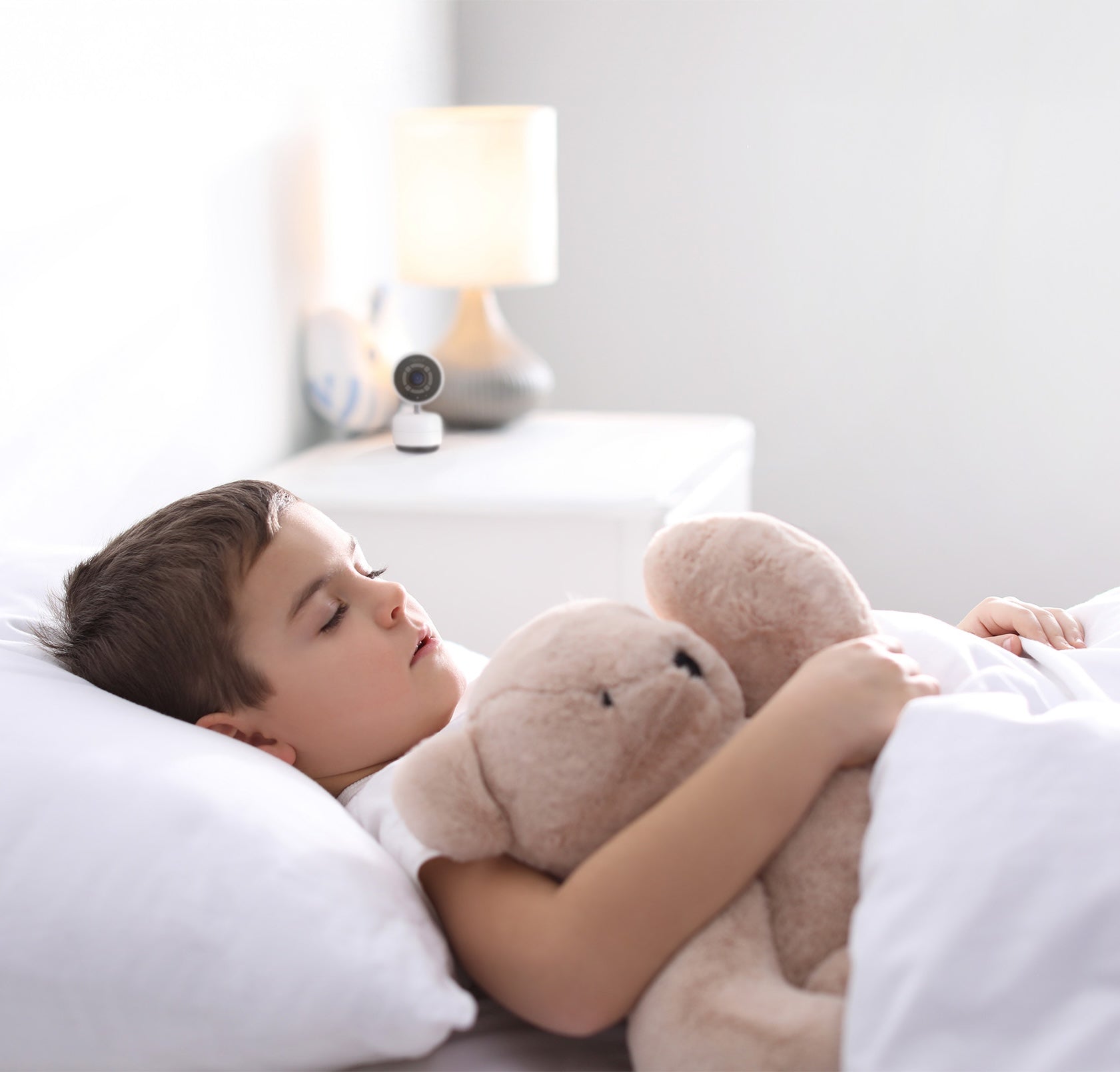 boy sleeping in bed