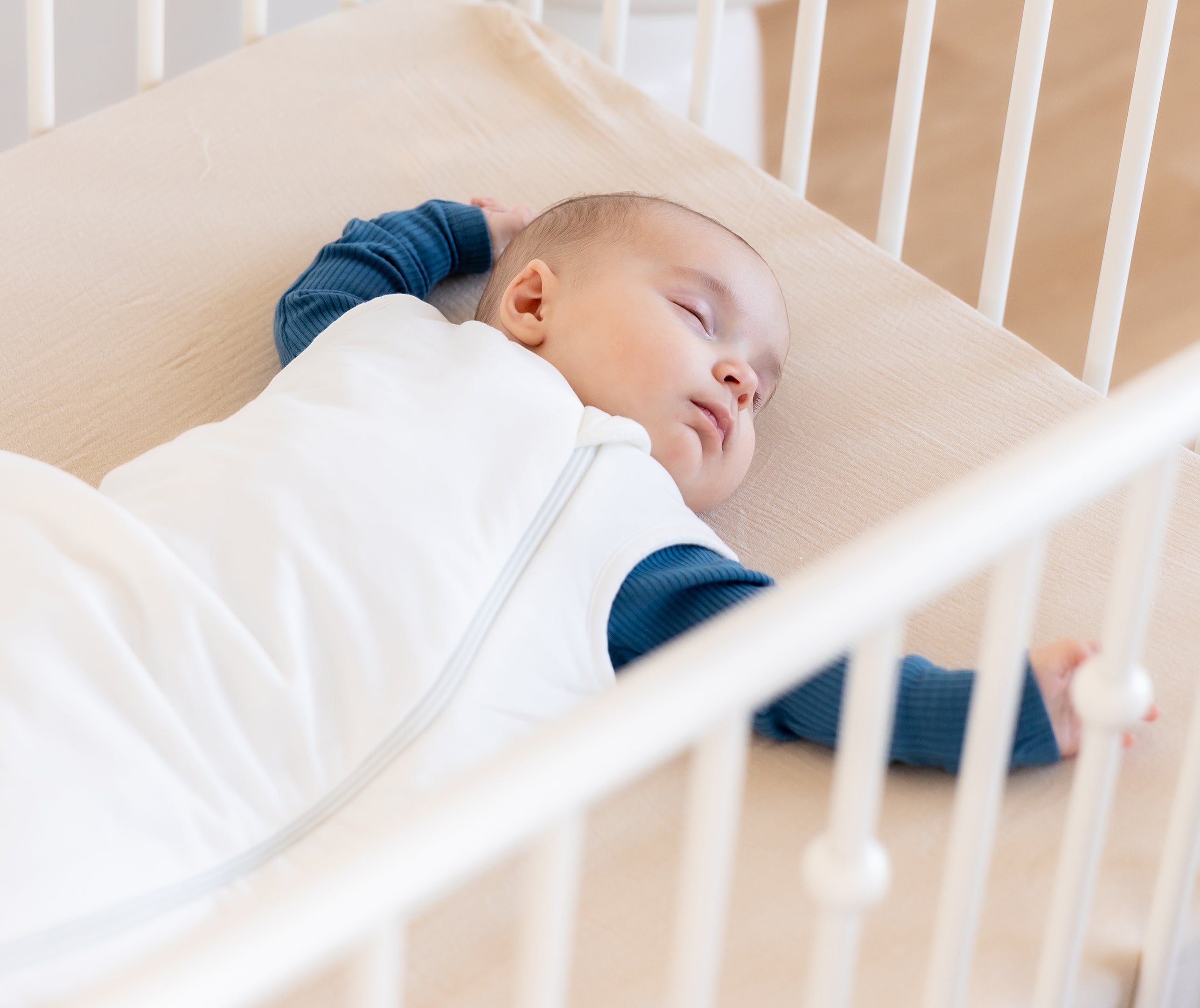 sleeping baby in a crib