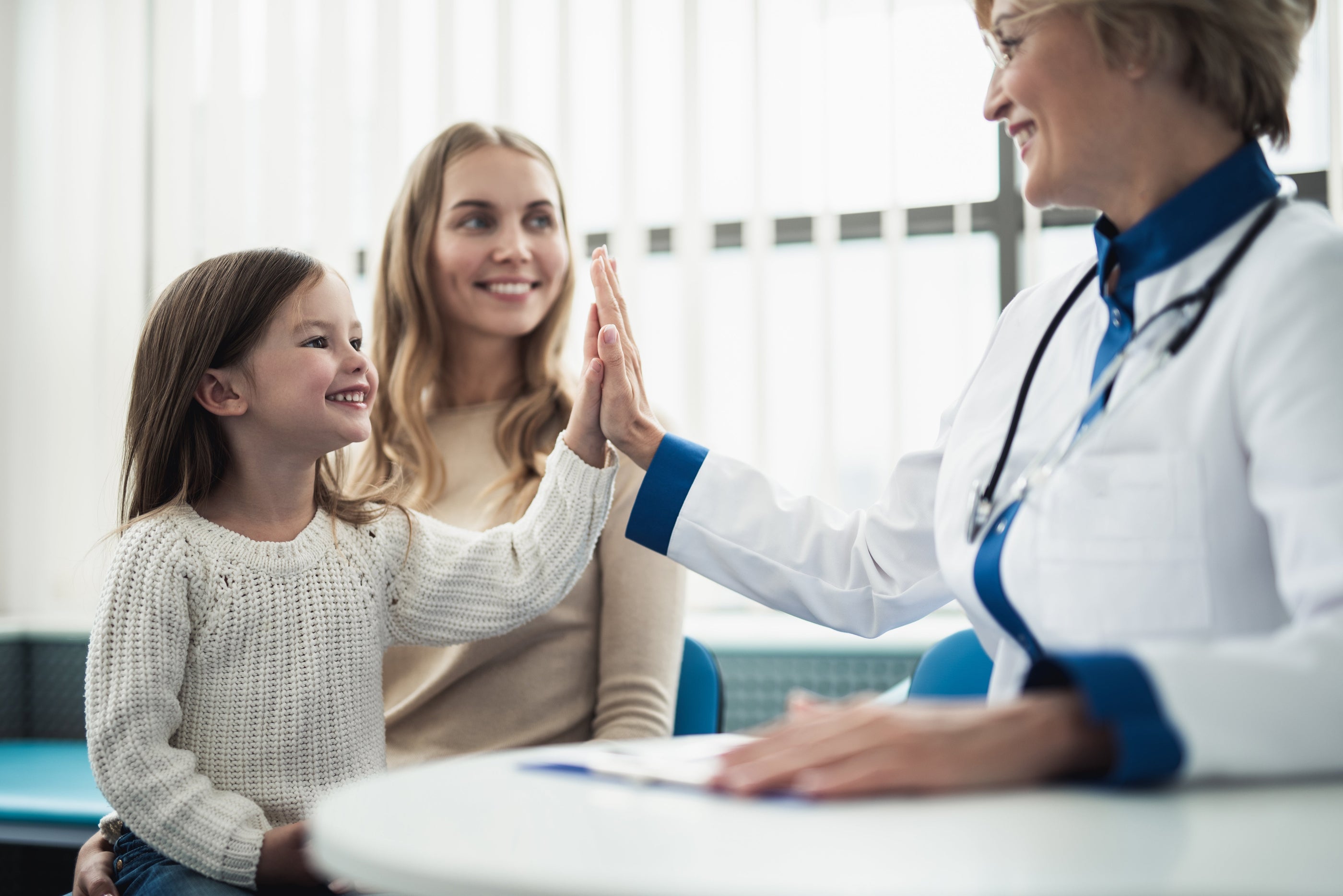 Girl & Mom at Doctor's office