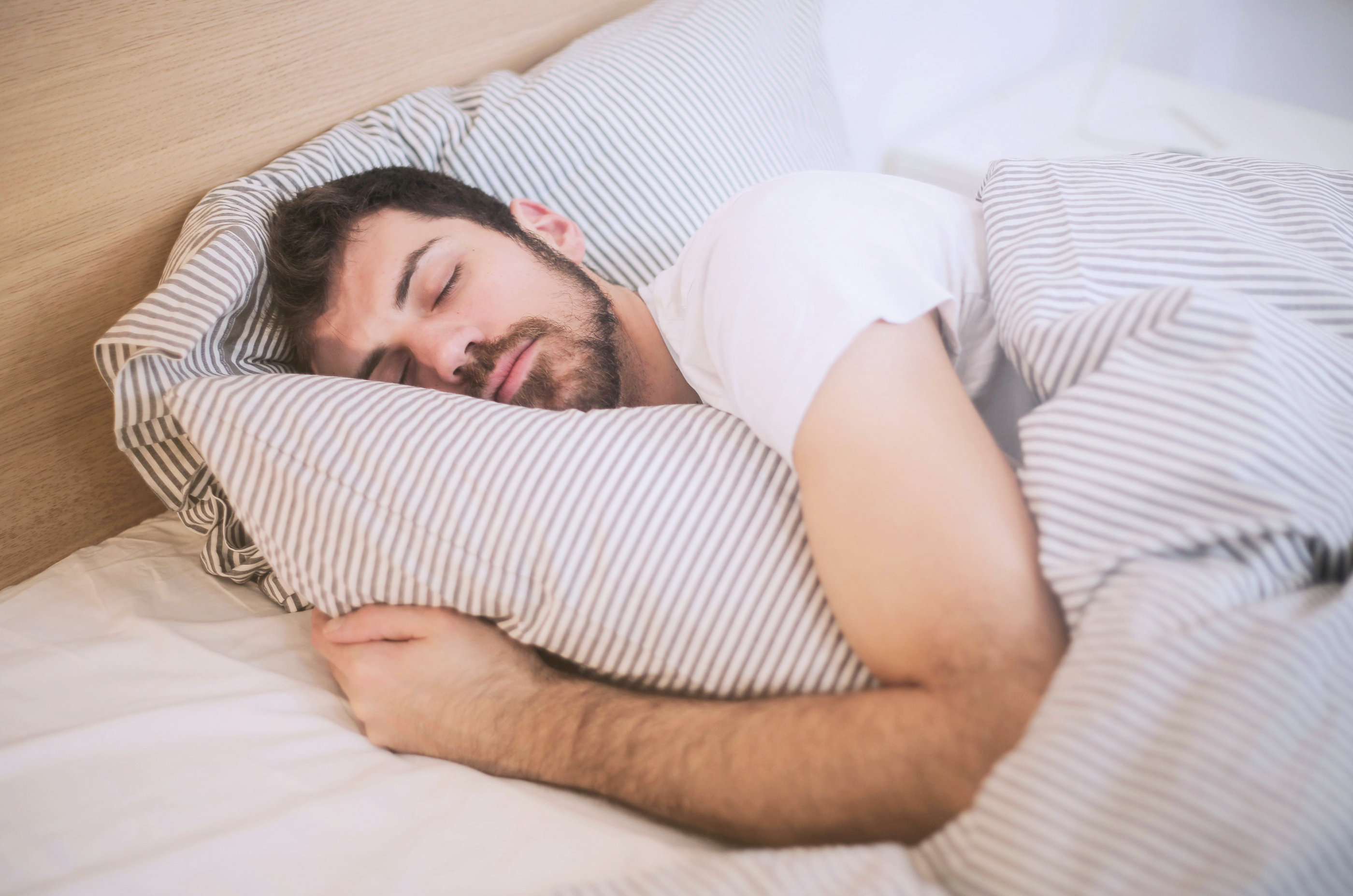 Man sleeping in bed