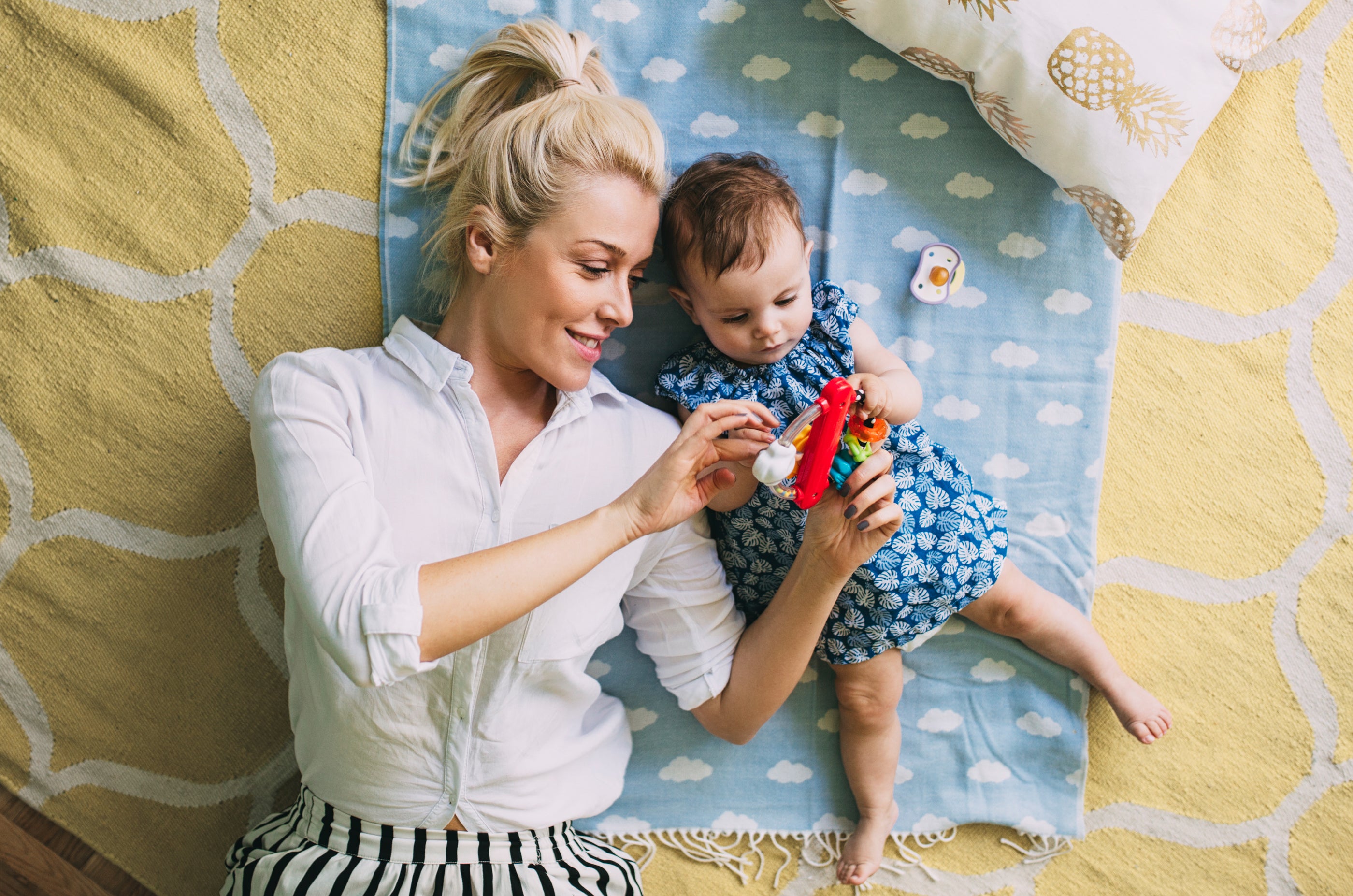 Mom and baby playing on floor