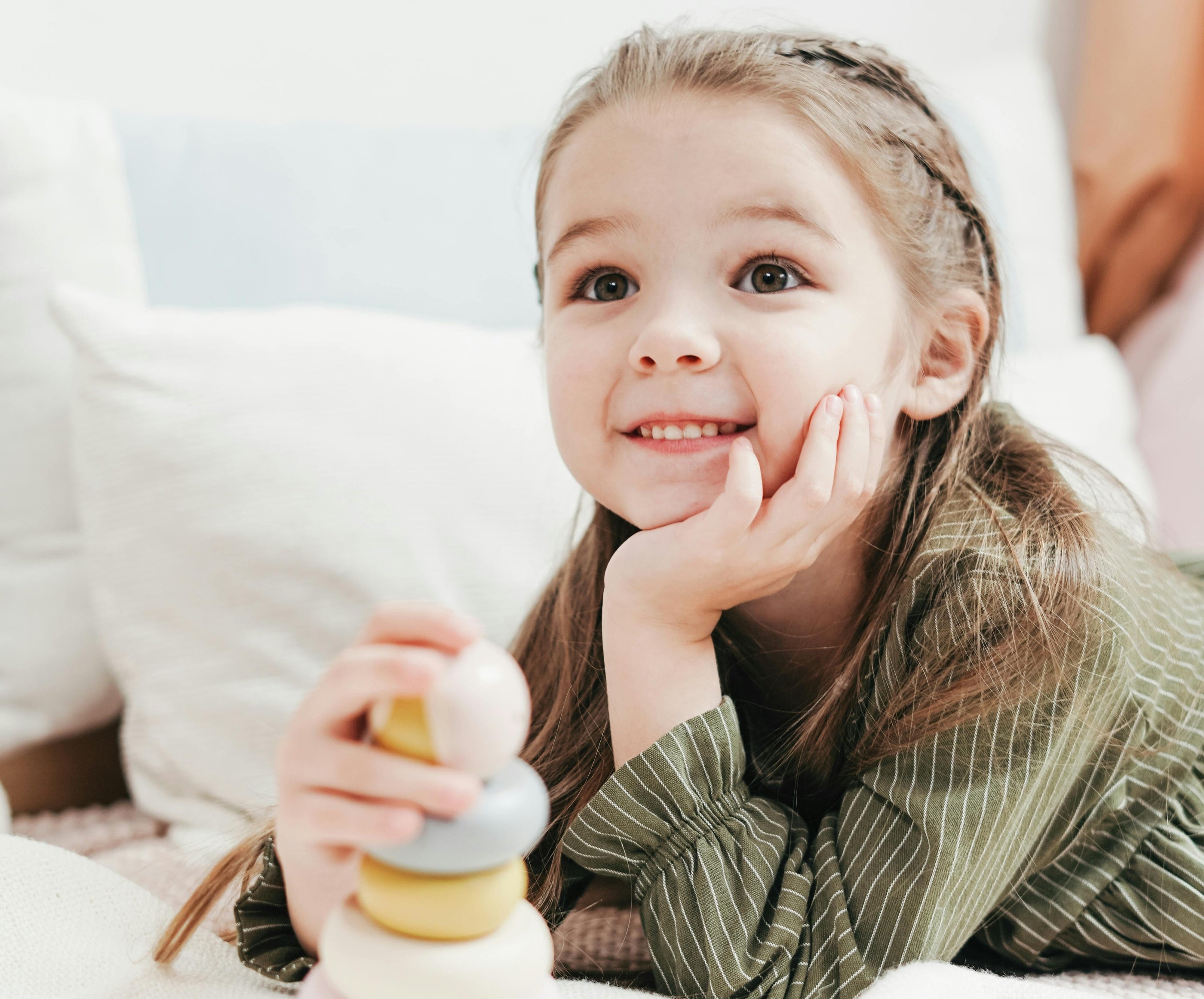 Toddler playing with toys