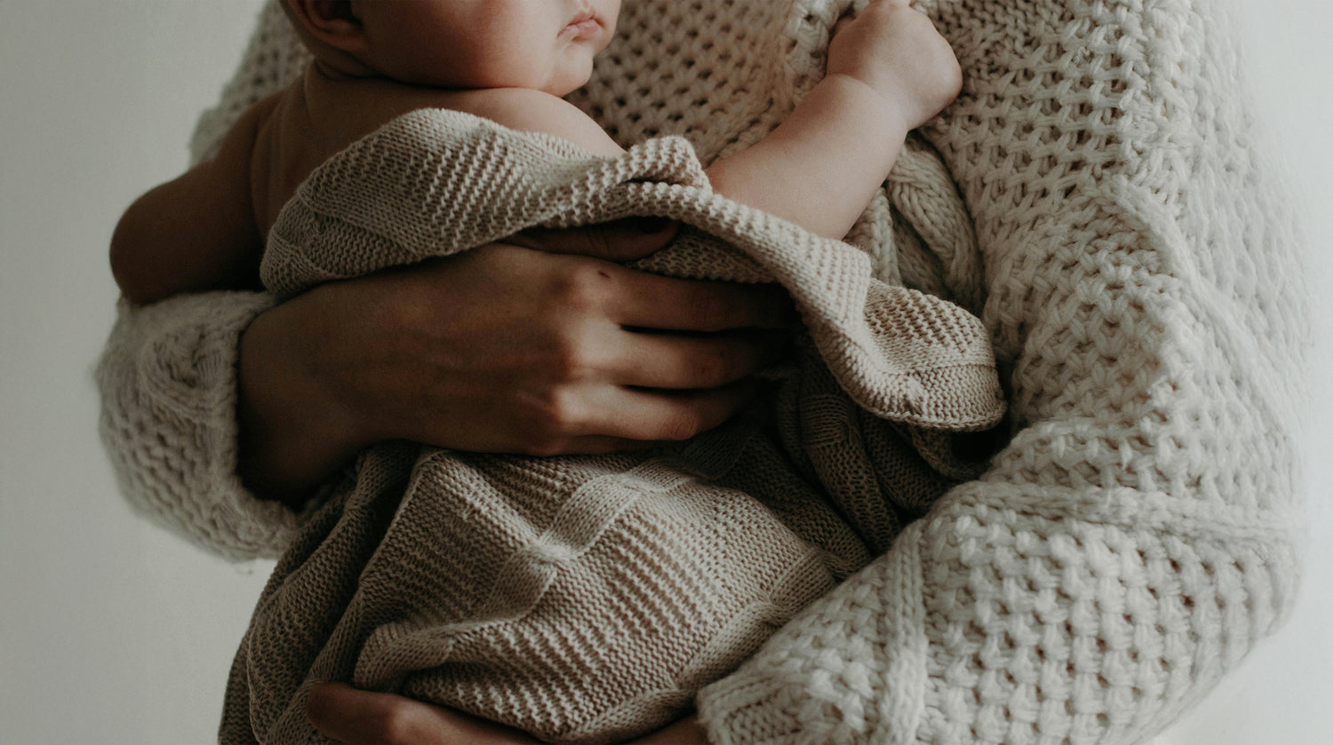 Mom holding her newborn baby