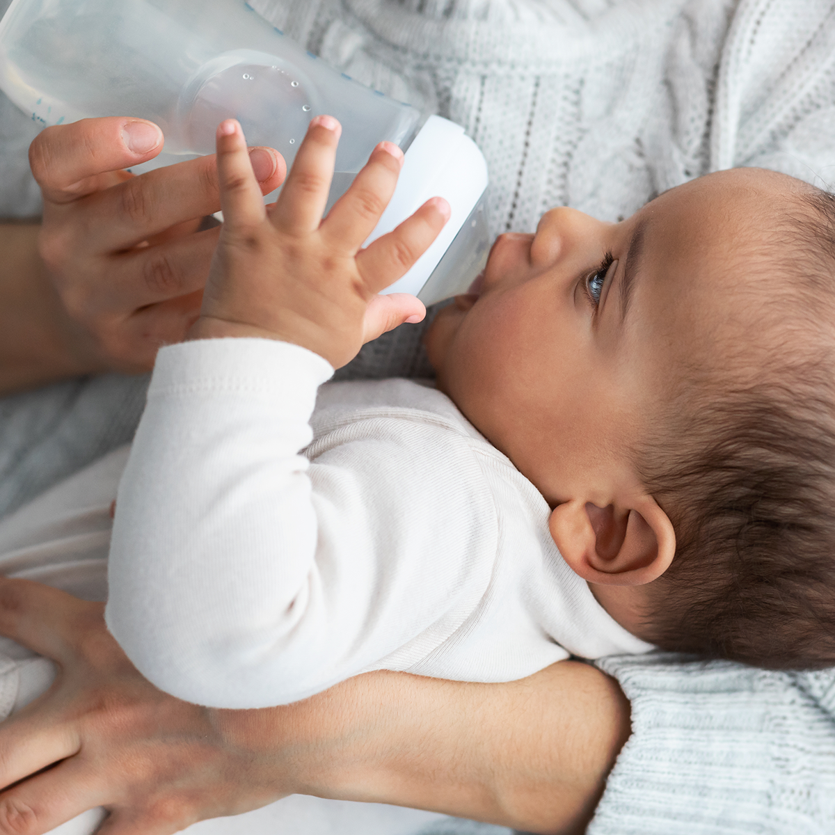 baby drinking from bottle