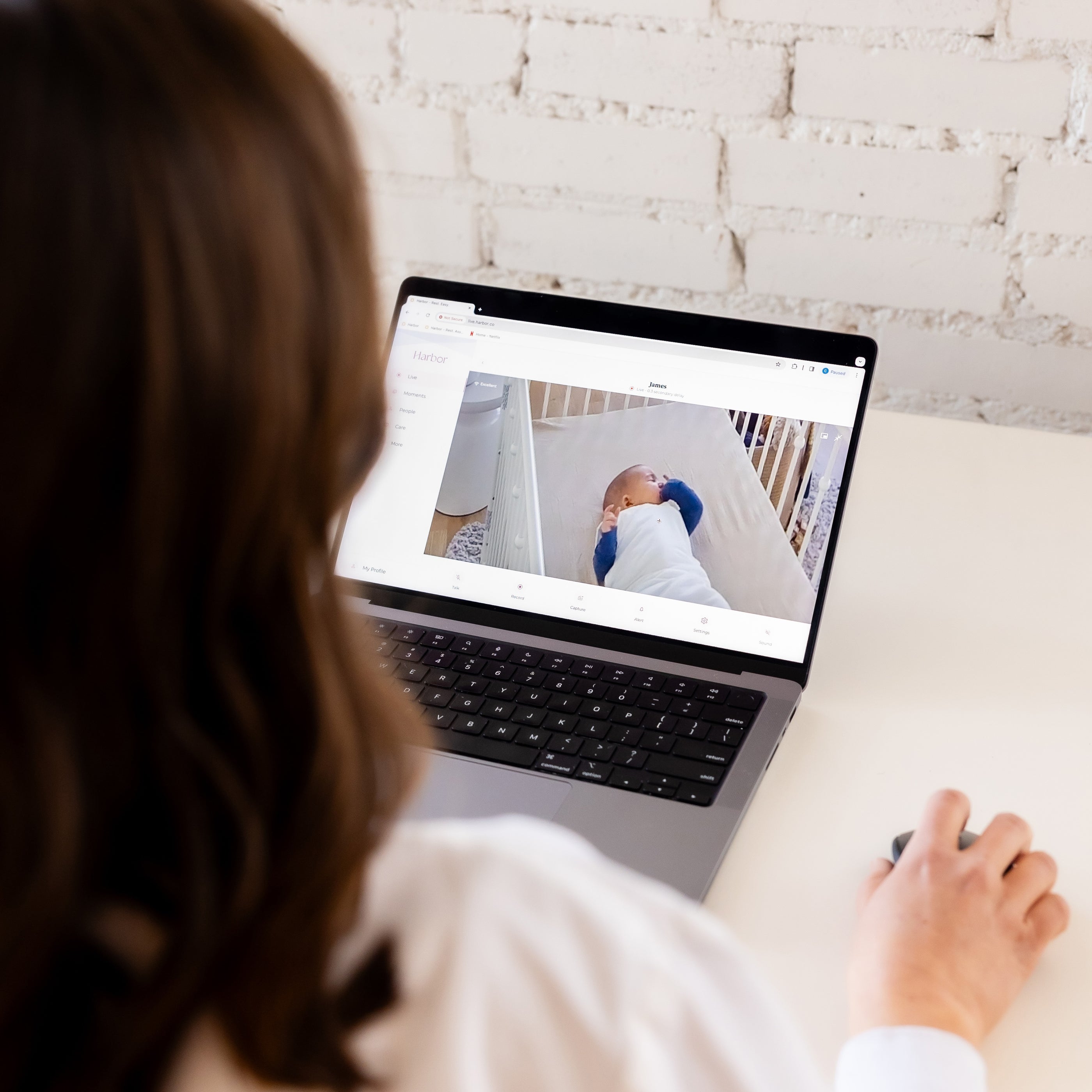Woman looking at laptop computer