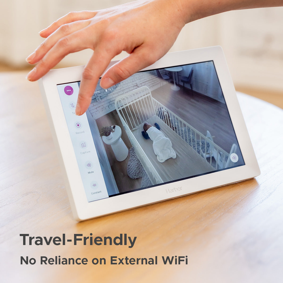 image of hand on monitor with text overlay: Travel-Friendly. No Reliance on External WiFi